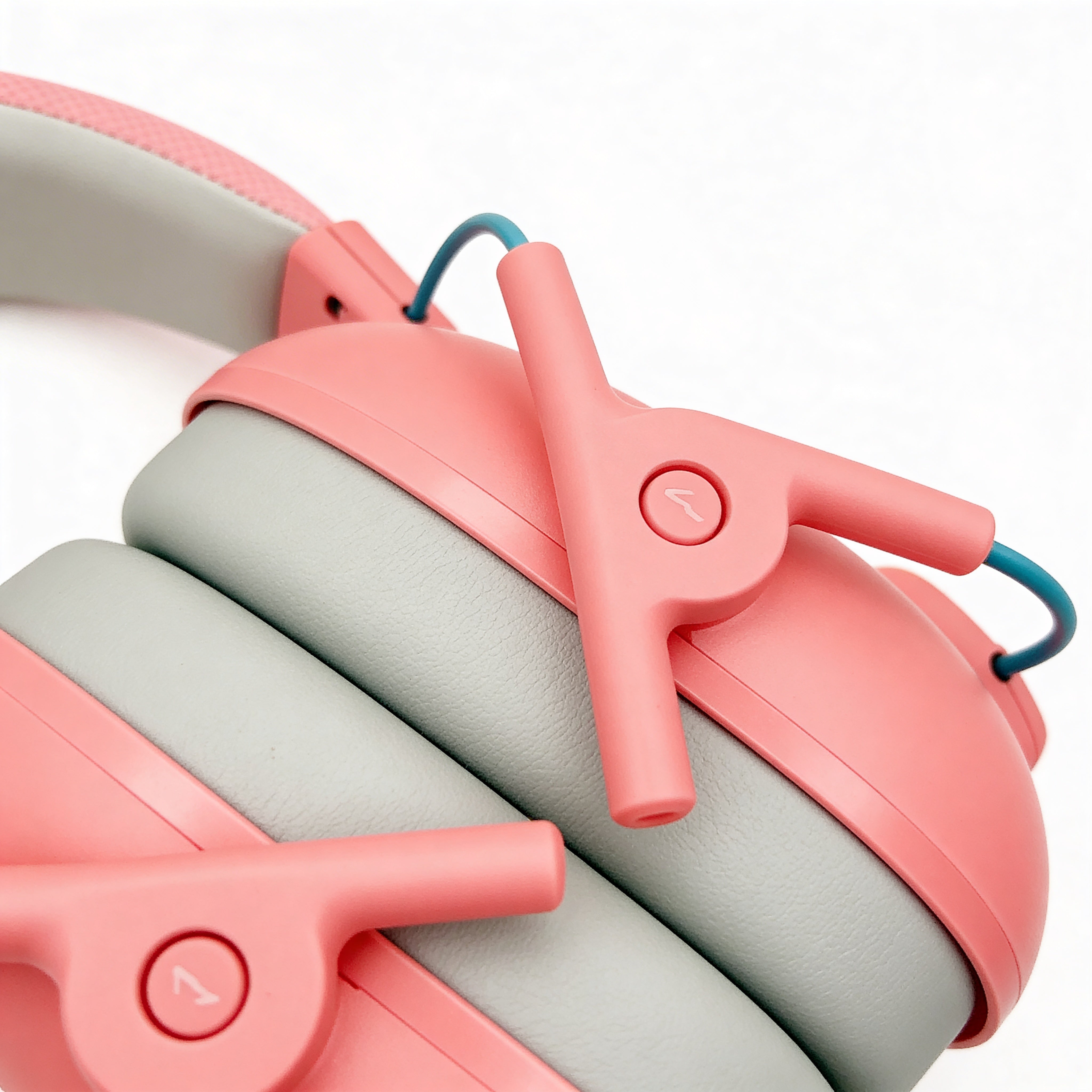 Close-up of pink and gray roller set on a white background