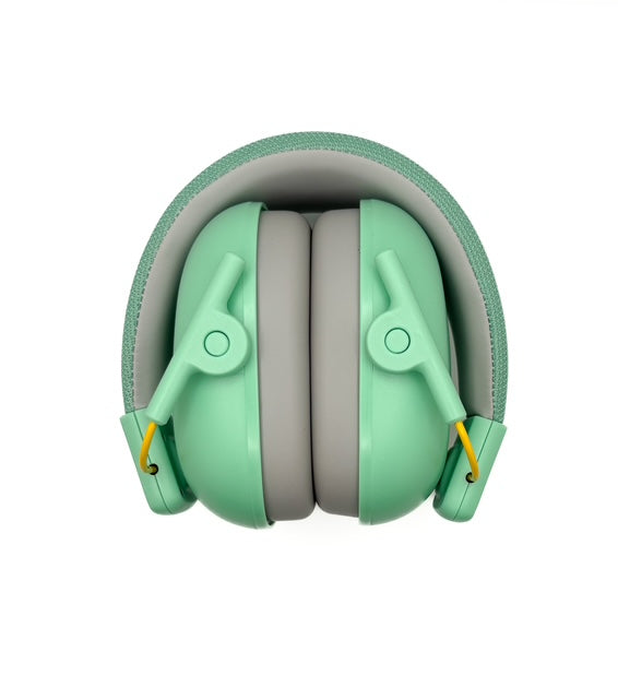 Green children's headphones on a white background