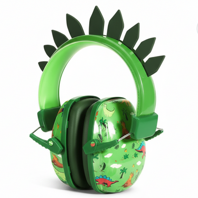 Green children's headphones with dinosaur design on a white background
