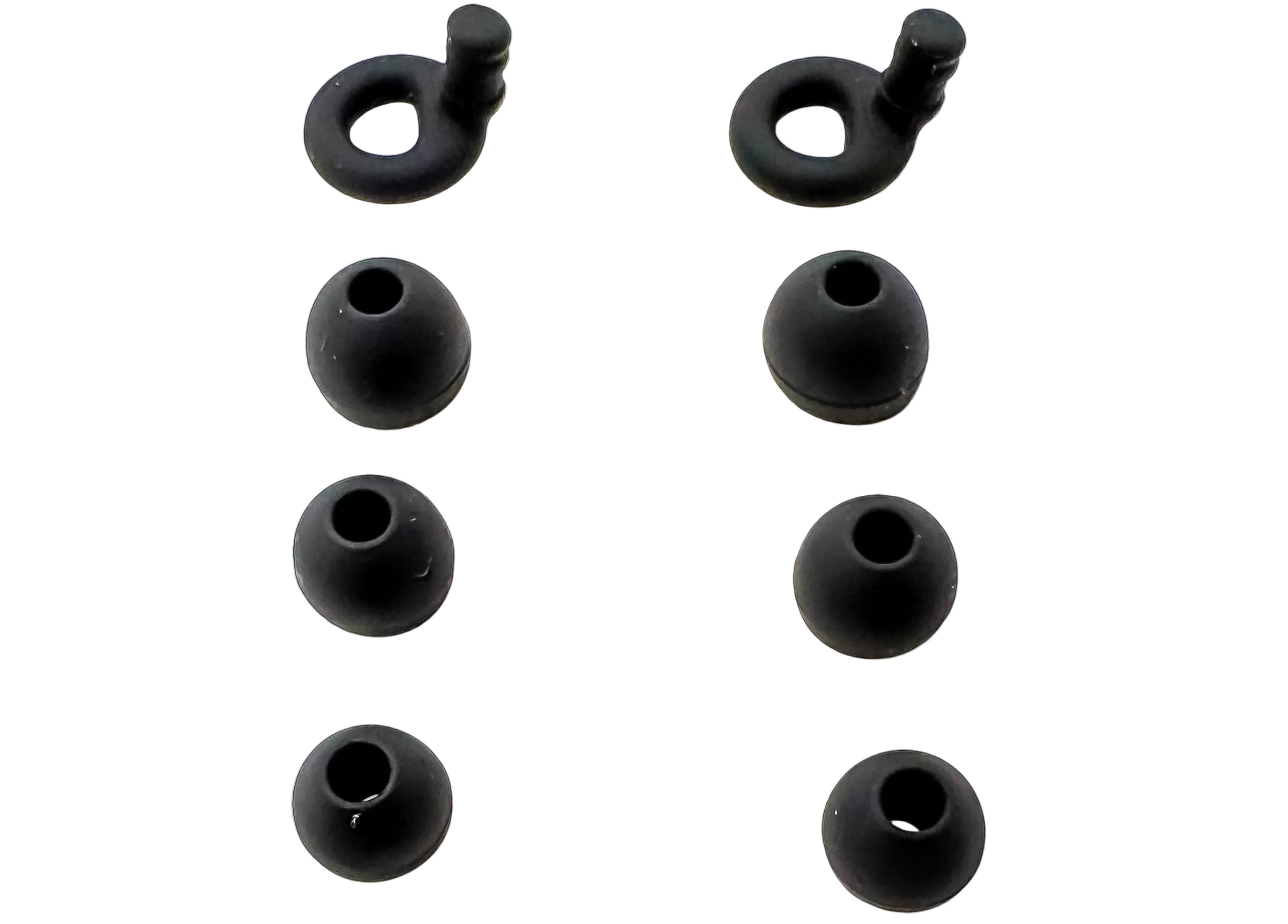 Set of black silicone earbud tips on a white background