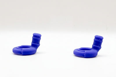 Two Royal Blue Ollybuds on a white background