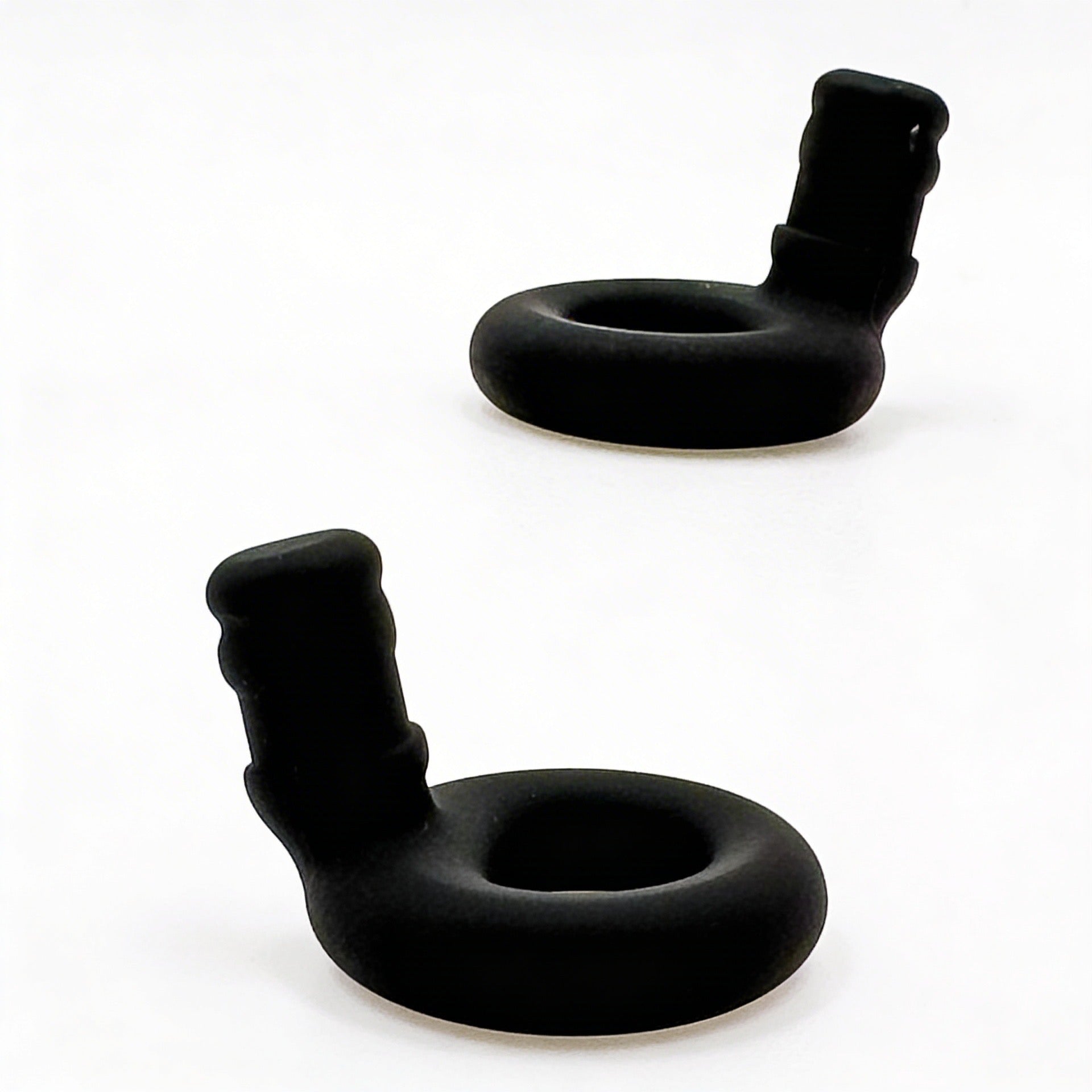 Two black rubber ollybuds on a white background