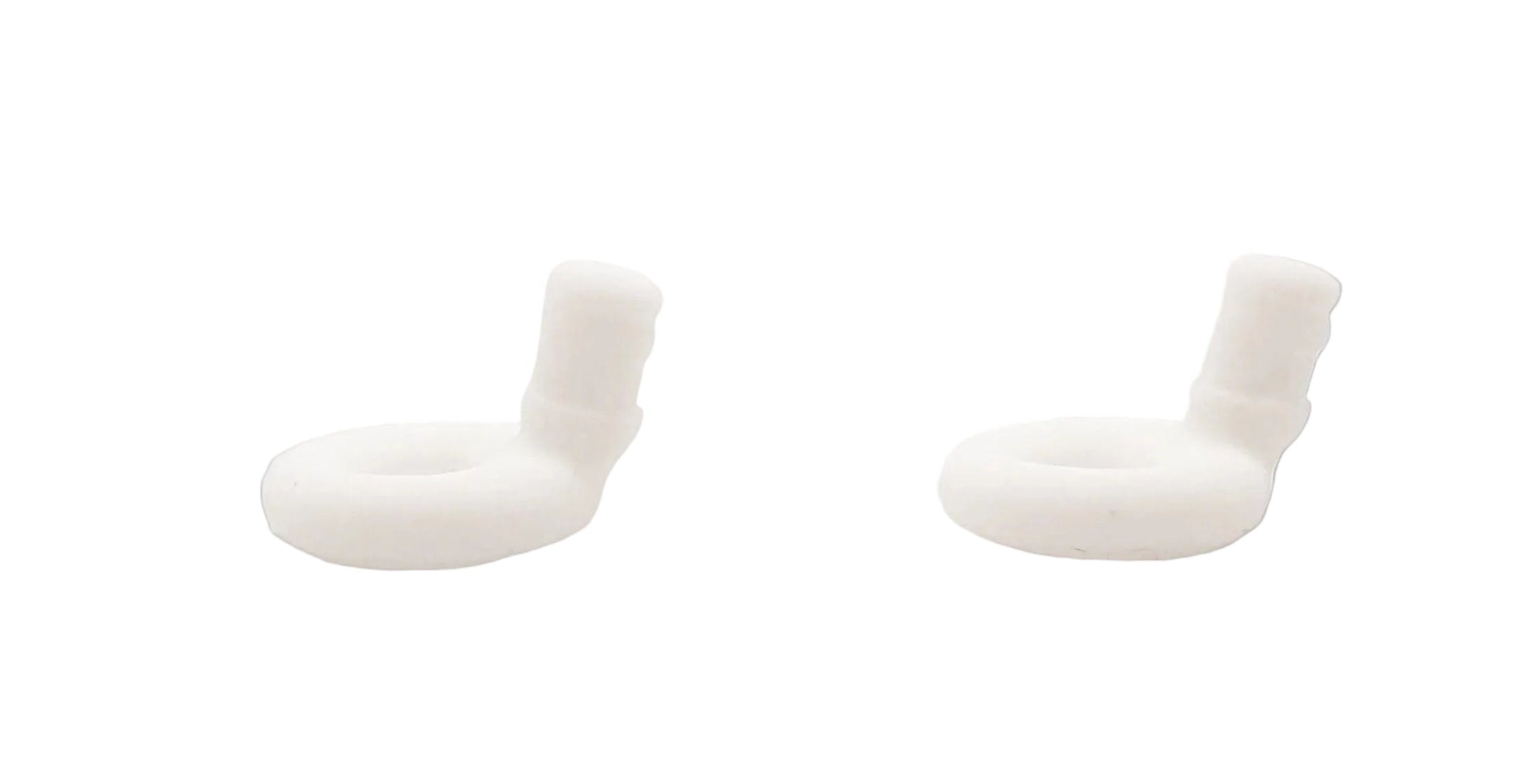 Two white Ollybuds on a white background